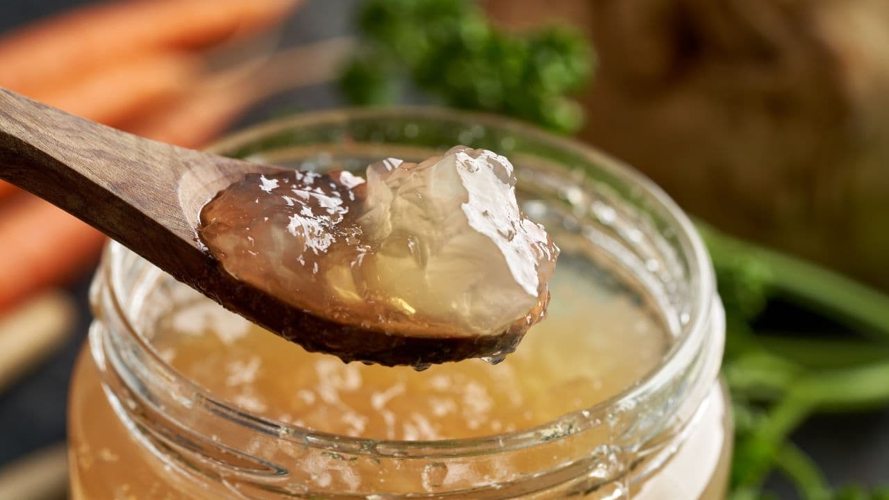 Clear chicken bone broth with vegetables